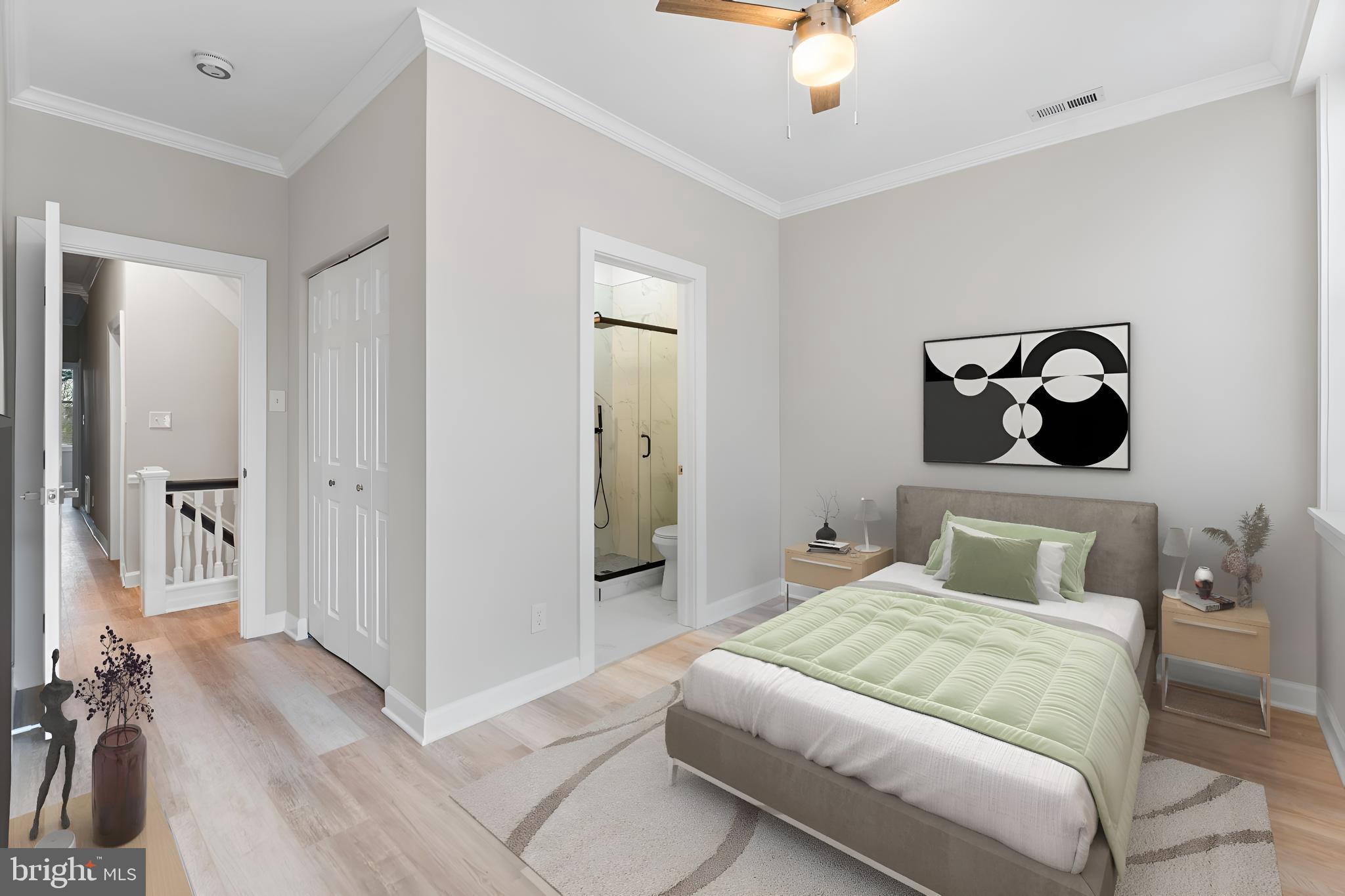 1003 West Fayette Street Baltimore, MD 21223 - Photo 2 of 59 a bedroom with a bed and a chandelier