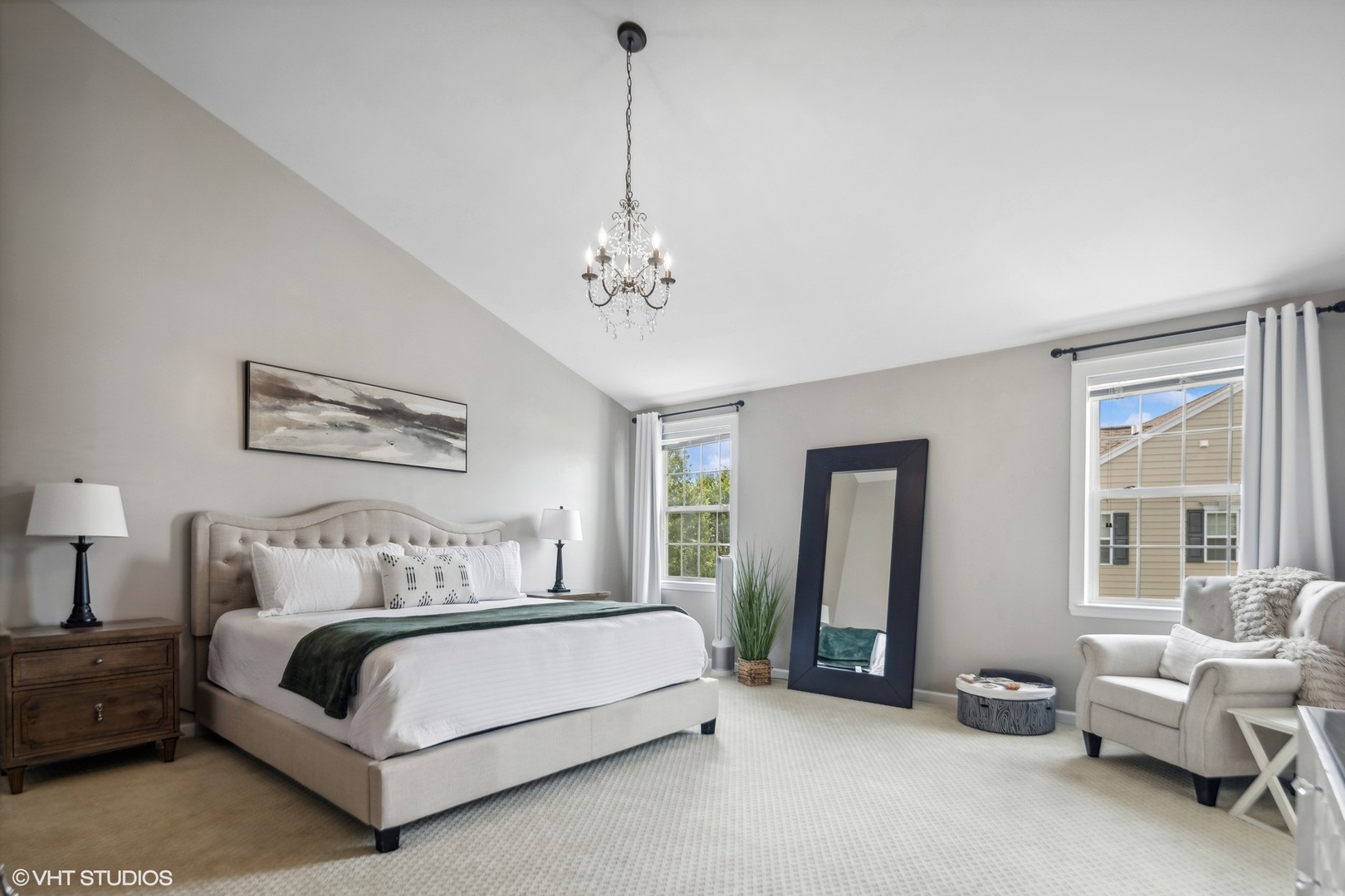 1160 Falcon Ridge Drive Elgin, IL 60124 - Photo 10 of 19 a spacious bedroom with a bed a couch and a chandelier