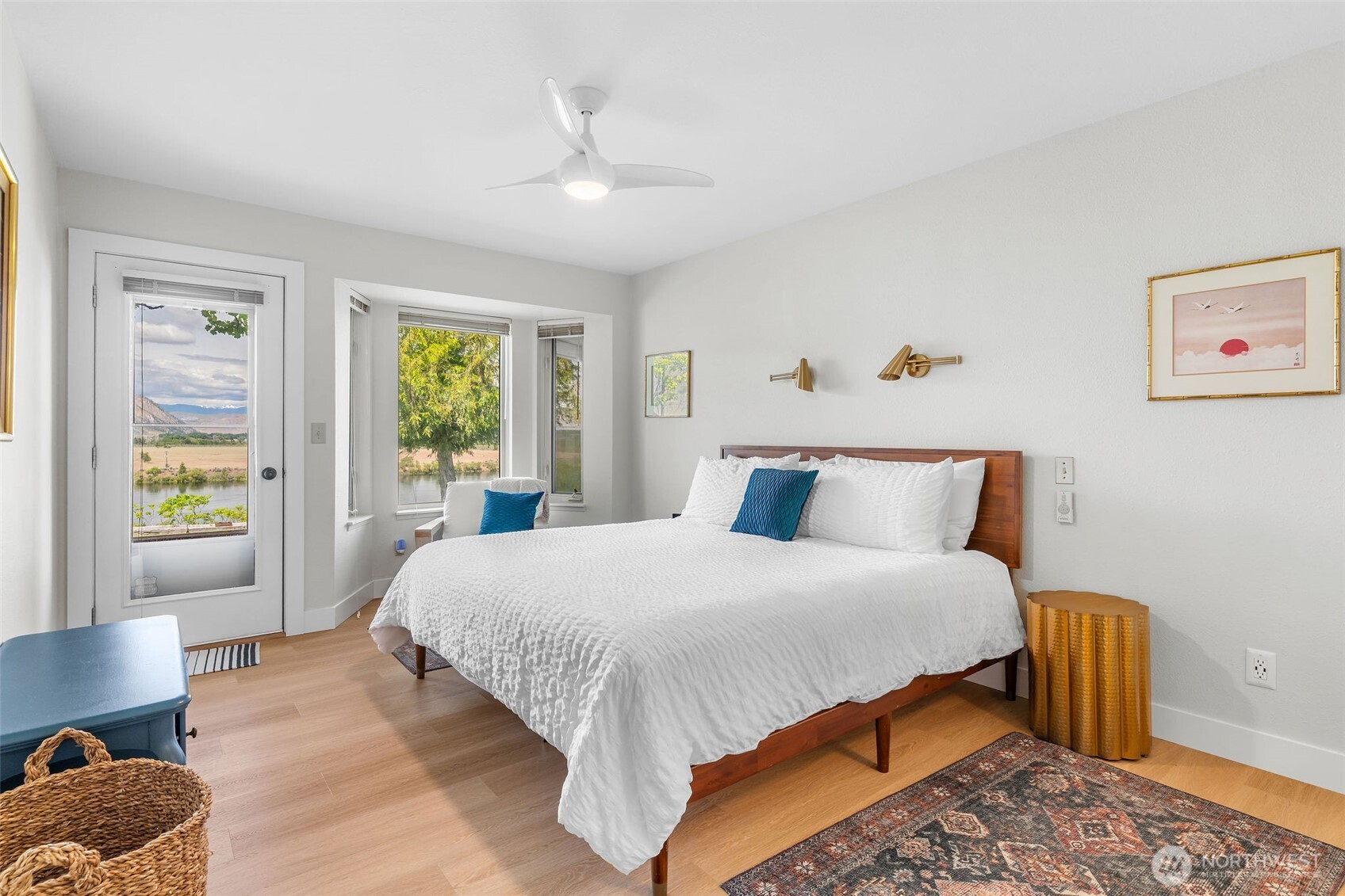 32 Midland Road Brewster, WA 98812 - Photo 19 of 40 a bedroom with a bed and wooden floor