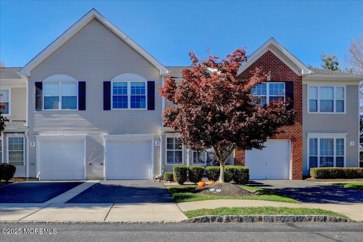 3 Ganton Way Manalapan, NJ 07726 - Photo 2 of 39 a front view of a house with a yard