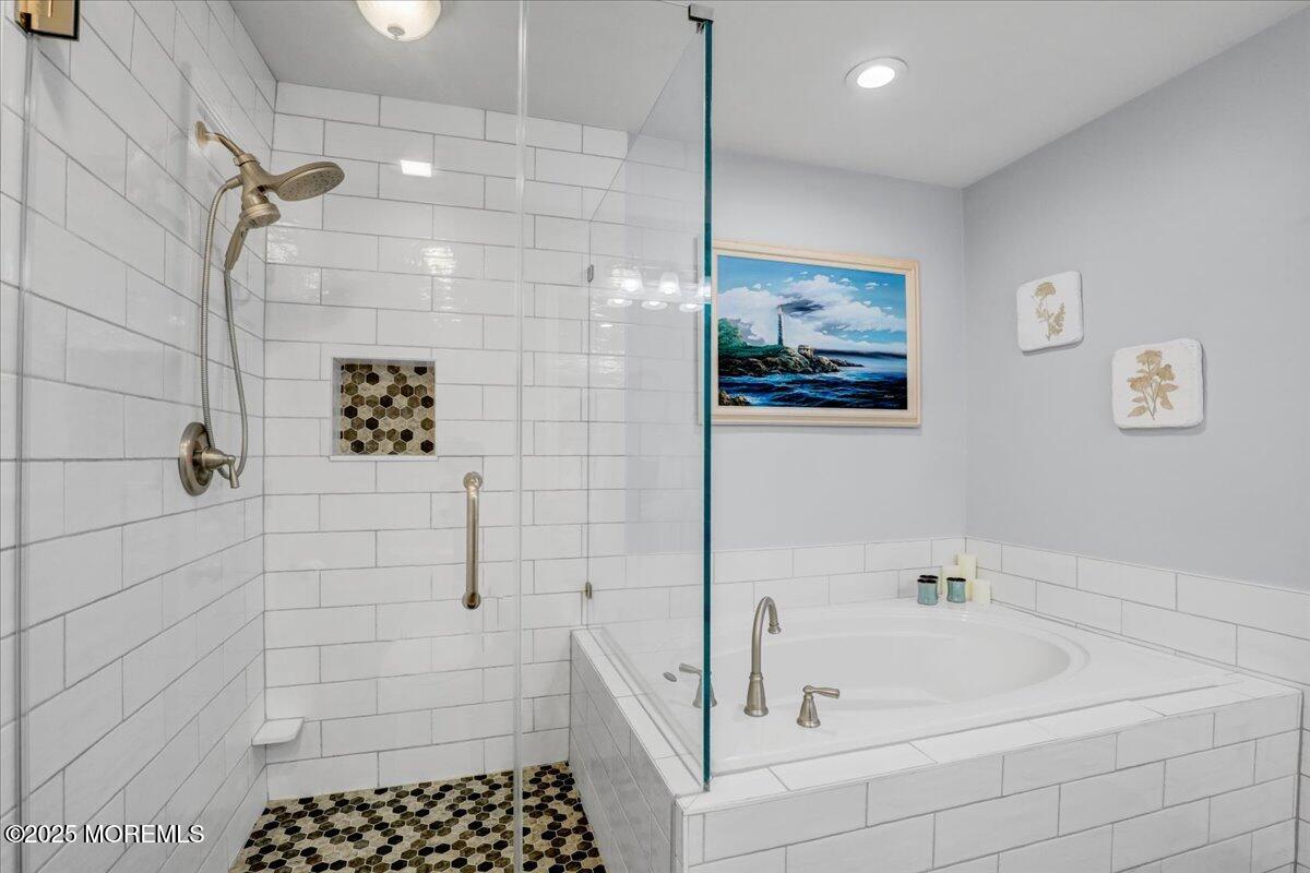 3 Ganton Way Manalapan, NJ 07726 - Photo 23 of 39 a bathroom with a bathtub and shower