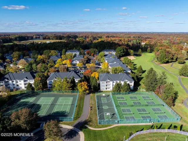 a view of building with a big yard