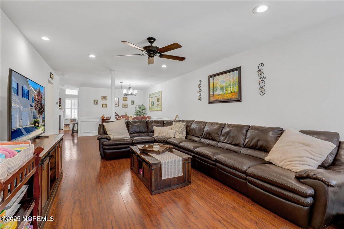 3 Ganton Way Manalapan, NJ 07726 - Photo 6 of 39 a living room with furniture and a flat screen tv
