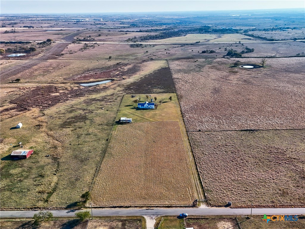 1165 County Road 238 Georgetown, TX 78633 - Photo 23 of 26 an aerial view of residential houses with outdoor space