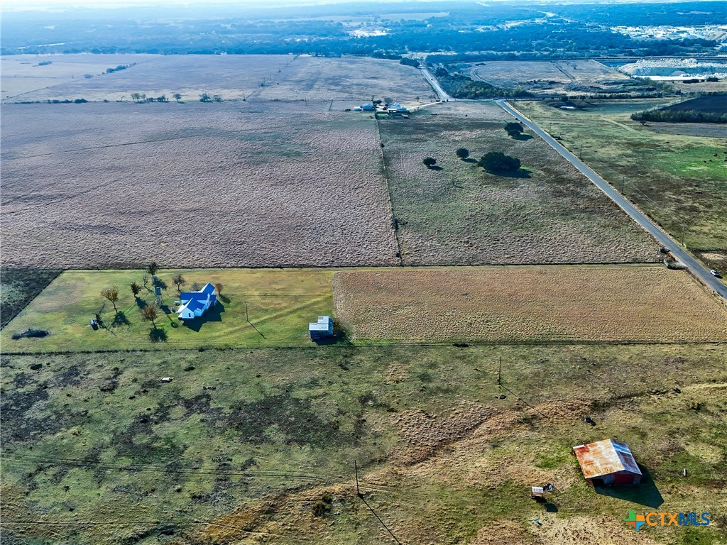 1165 County Road 238 Georgetown, TX 78633 - Photo 26 of 26 a view of a yard with an ocean