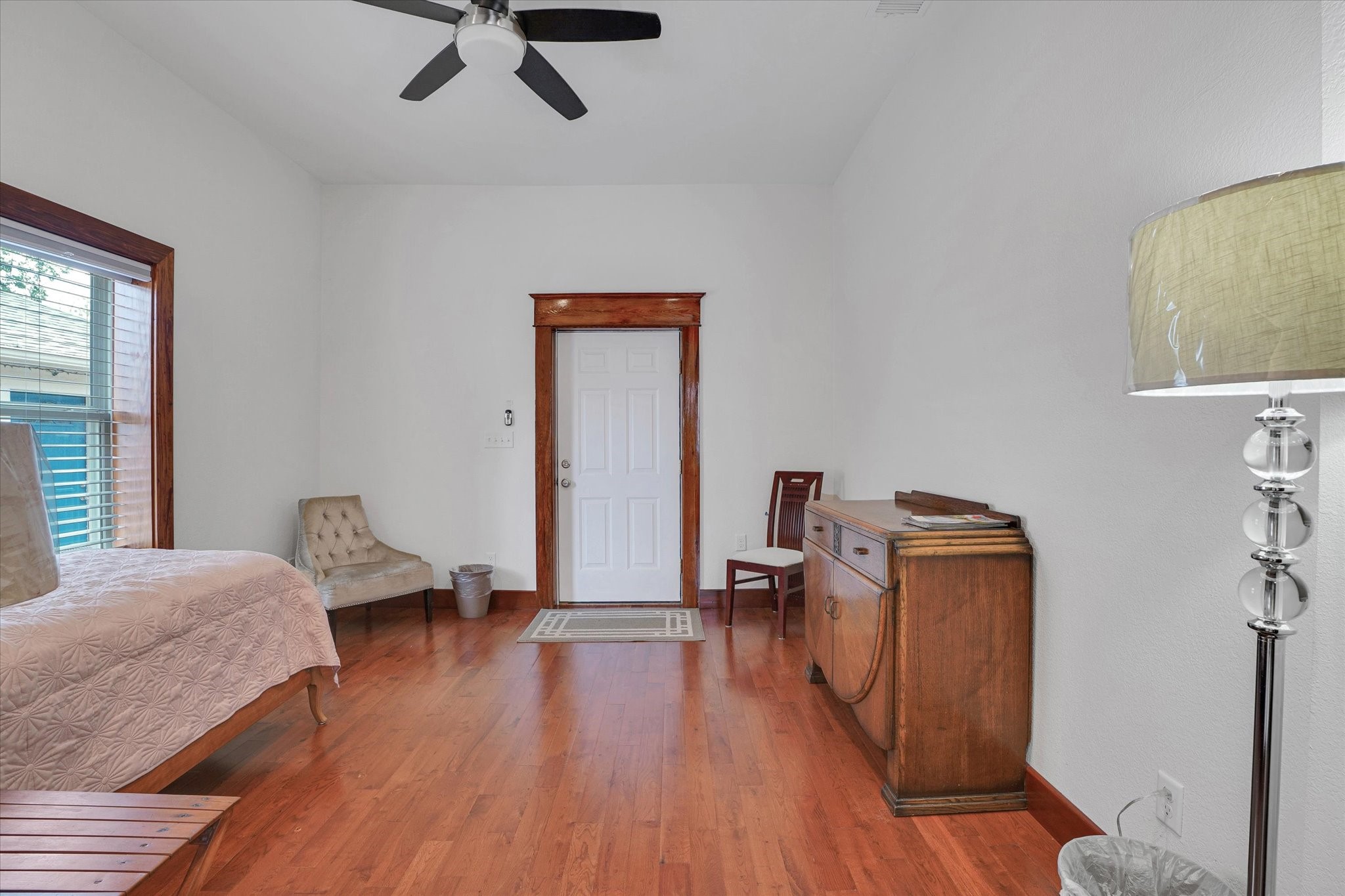 1916 Hardy Street Houston, TX 77026 - Photo 21 of 42 Adjoining room to bedroom #2 has an exit to the rear patio. This space is appx 8'X11'.