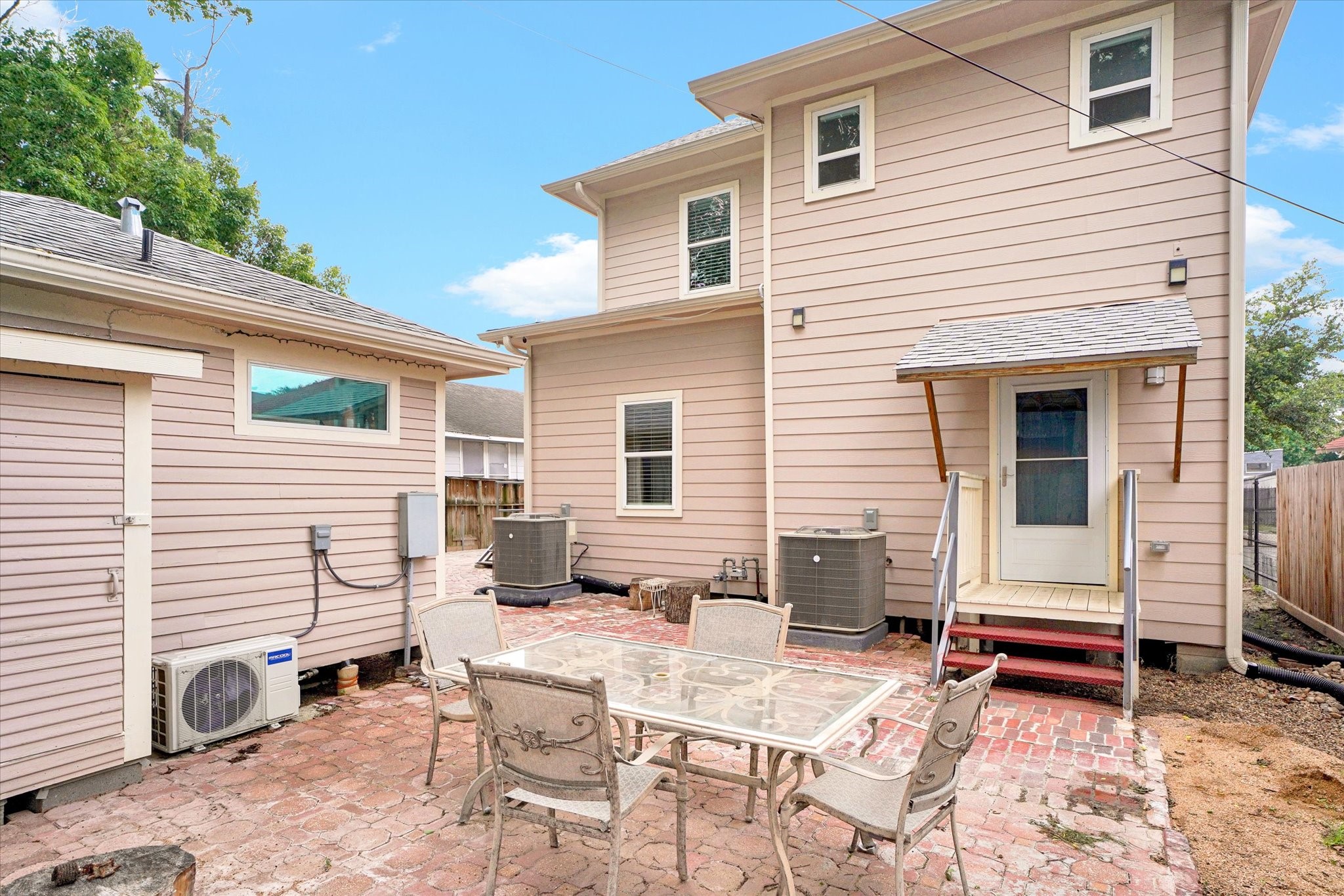 1916 Hardy Street Houston, TX 77026 - Photo 39 of 42 Rear patio. Note rear door coming out of the 2nd utility room. So this building has 5 entrance/exits.