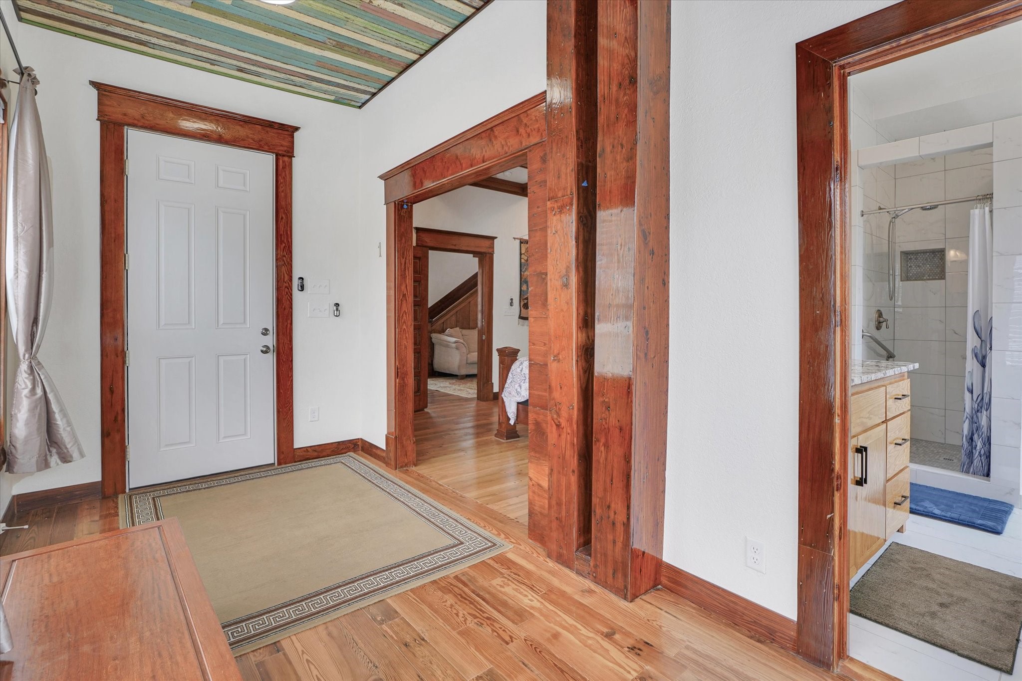1916 Hardy Street Houston, TX 77026 - Photo 9 of 42 Separate ingress-egress in bedroom #1. Flooring in this area is mostly red pine.