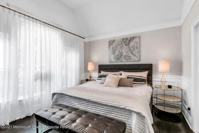 a kitchen with stainless steel appliances kitchen island granite countertop a refrigerator and a stove