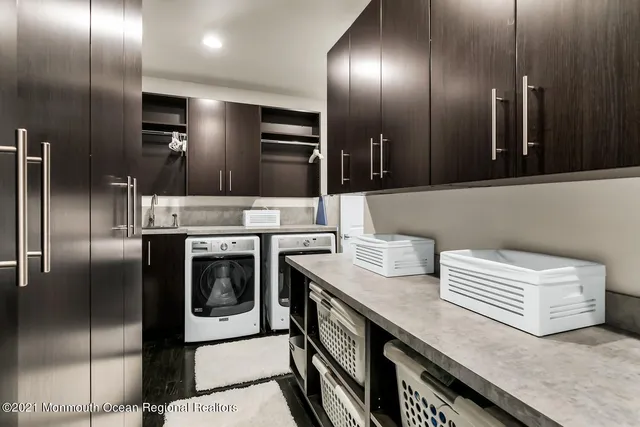 a bathroom with a sink toilet and mirror
