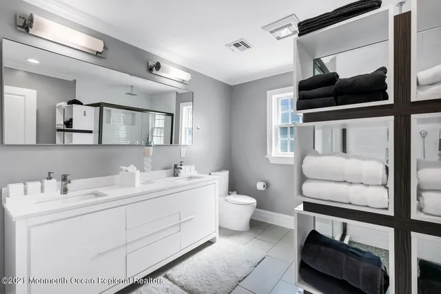 a bedroom with bed and window