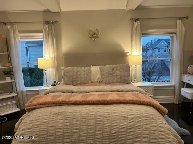 a room with gym equipment and a large window