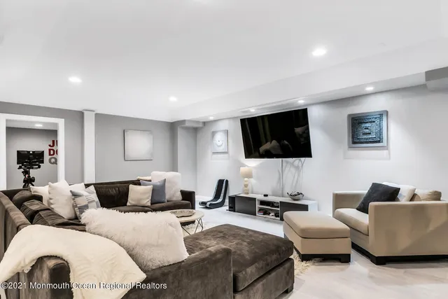 an outdoor space with furniture and umbrella