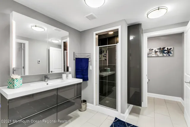 a view of a patio with couches table and chairs and potted plants