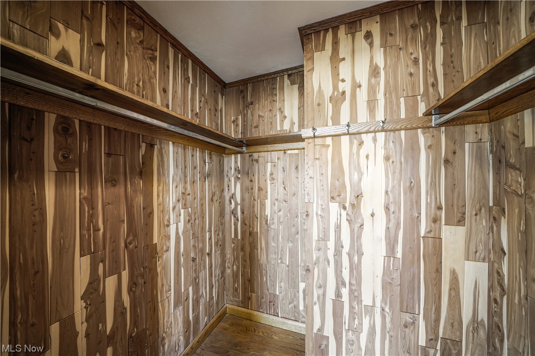 10258 Gilbert Road Newton Falls, OH 44444 - Photo 11 of 37 Walk in closet featuring dark hardwood / wood-style flooring