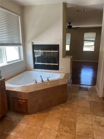 a room with furniture and a flat screen tv