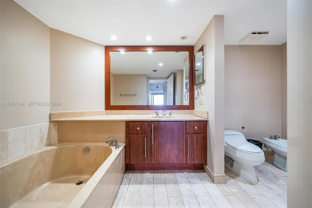 an aerial view of a house with swimming pool and outdoor space