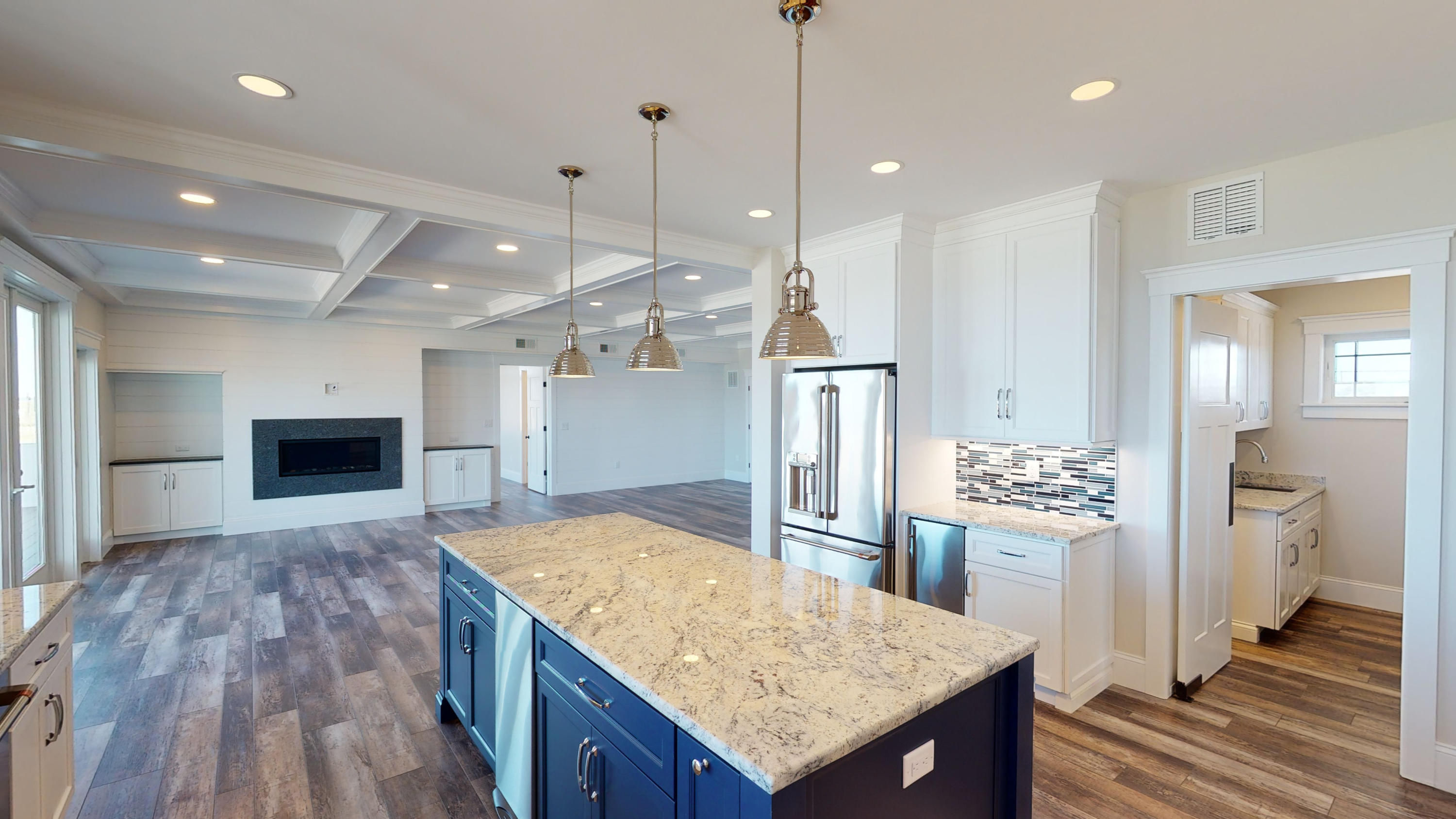 253 Phillips Road Sandwich, MA 02563 - Photo 4 of 28 a kitchen with stainless steel appliances granite countertop a refrigerator a oven and a wooden floor
