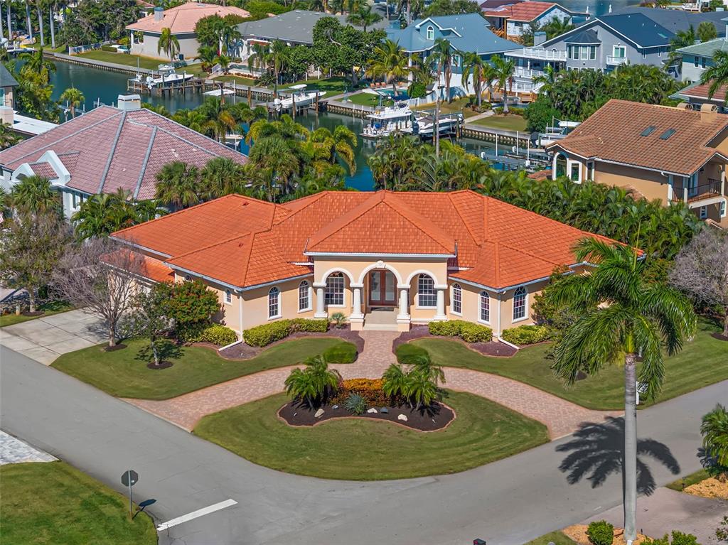 an aerial view of house with yard swimming pool and outdoor seating
