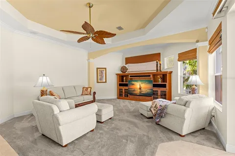 a view of a house with a yard porch and sitting area