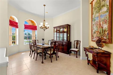 a bath tub sitting in a bathroom next to a window
