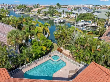 a view of a livingroom with workspace and a window