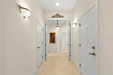 an aerial view of residential houses with outdoor space and river