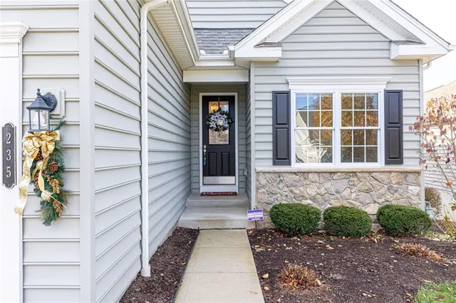 a front view of a house with a porch