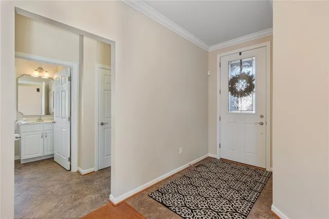 a view of room with window and bathroom