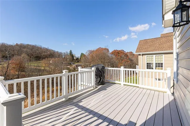 a view of a wooden roof deck