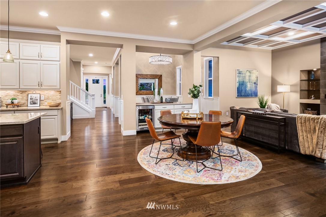 5724 197th Place Southeast Bothell, WA 98012 - Photo 12 of 40 a living room with furniture and kitchen view