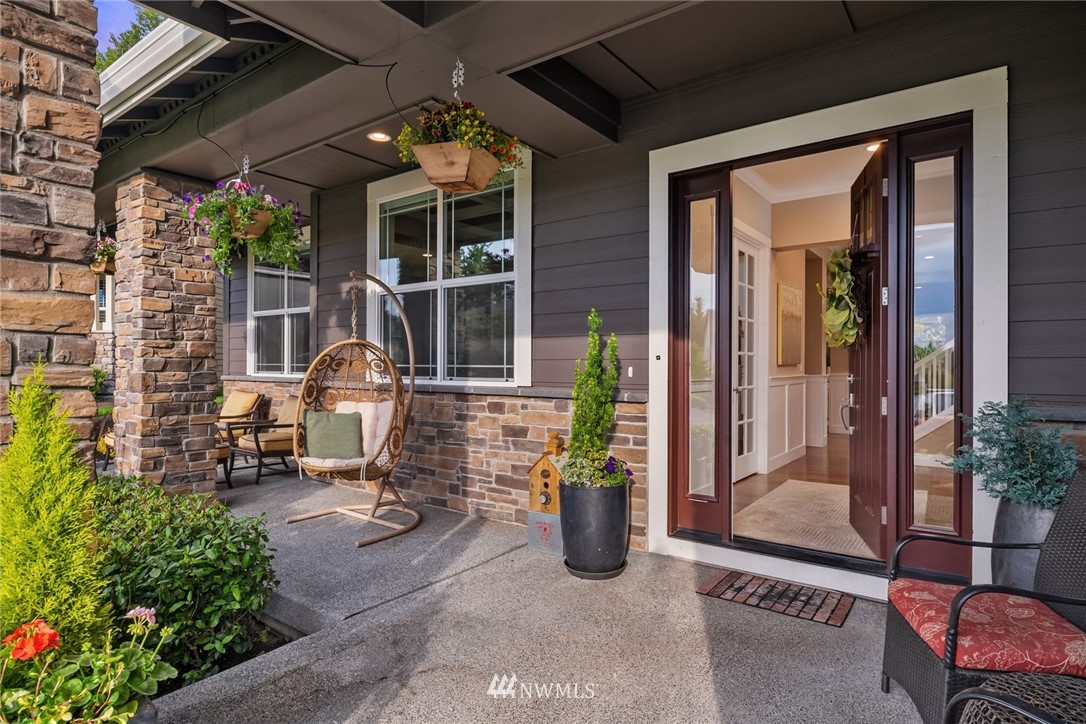 5724 197th Place Southeast Bothell, WA 98012 - Photo 3 of 40 a front view of a house with outdoor seating