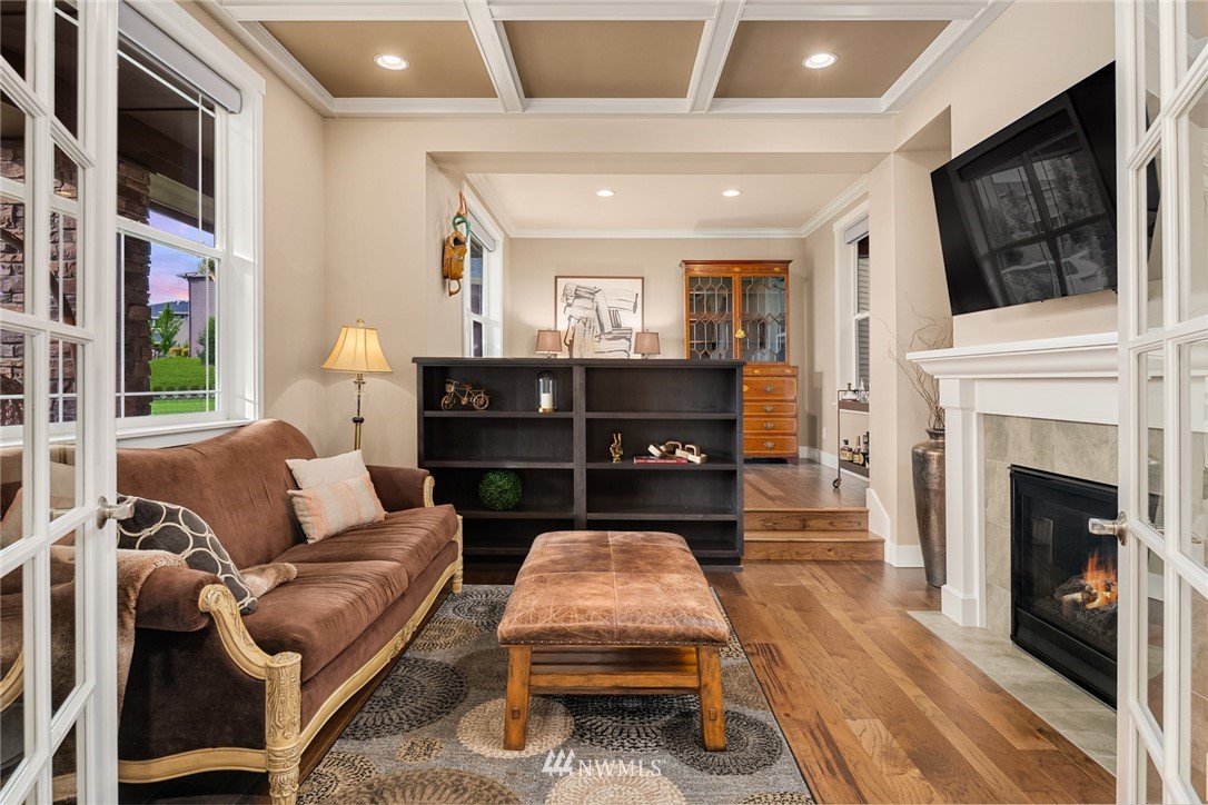 5724 197th Place Southeast Bothell, WA 98012 - Photo 22 of 40 a living room with furniture fireplace and flat screen tv