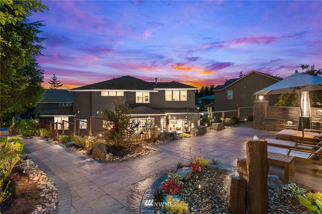 5724 197th Place Southeast Bothell, WA 98012 - Photo 36 of 40 a front view of a house with a yard