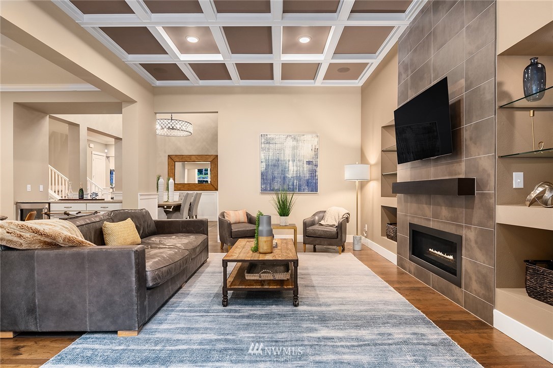 5724 197th Place Southeast Bothell, WA 98012 - Photo 5 of 40 a living room with furniture fireplace and flat screen tv