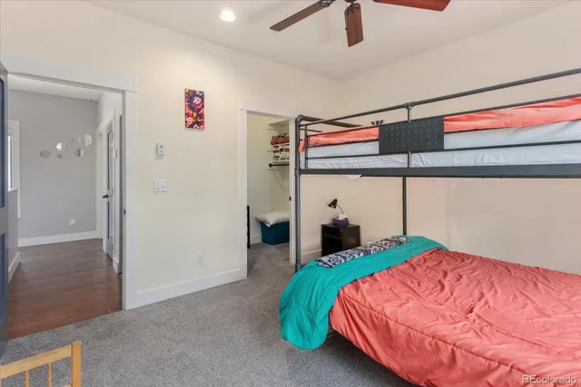 a bathroom with a sink vanity granite and a mirror