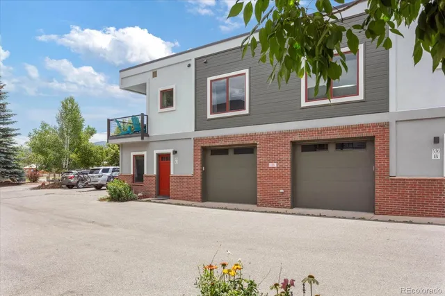 front view of a house with a street