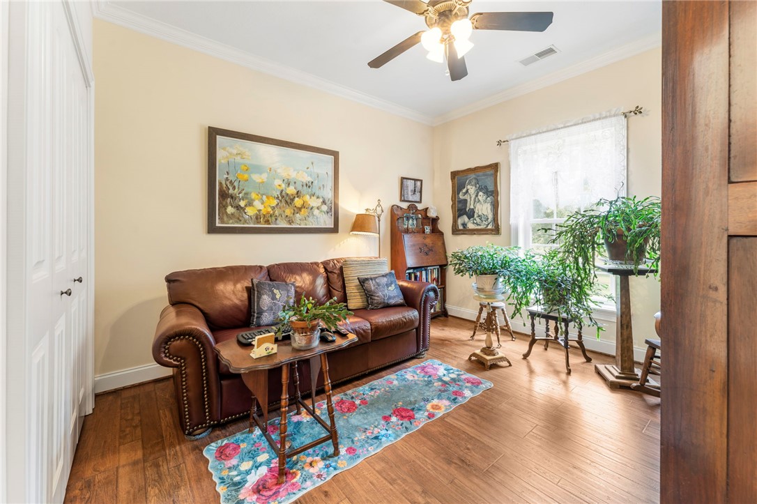 160 Sentell Road Williamston, SC 29697 - Photo 13 of 45 Hardwood floors and a soothing color palette create an inviting space, perfect for tranquil moments.