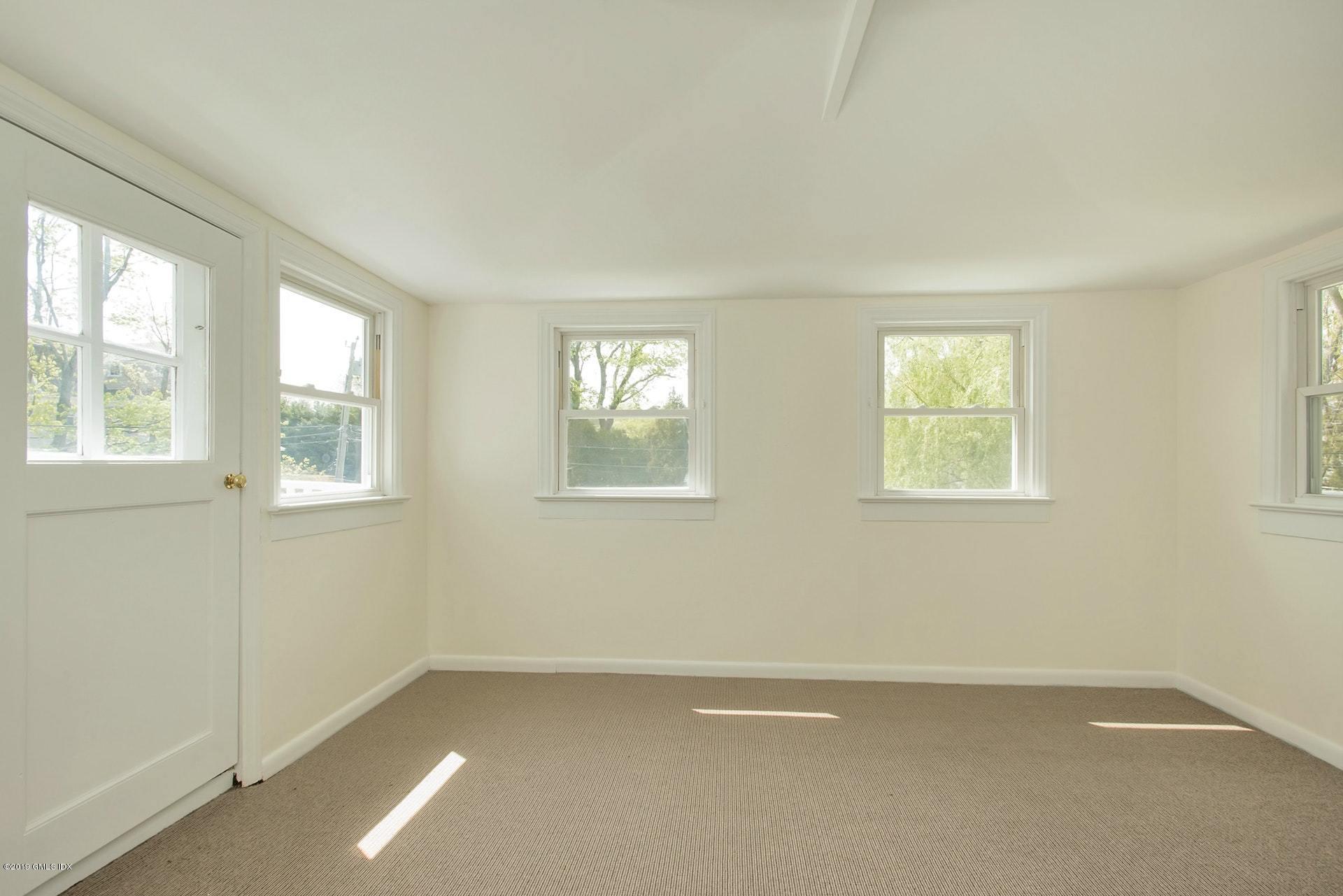 17 Ballwood Road Old Greenwich, CT 06870 - Photo 16 of 36 an empty room with windows