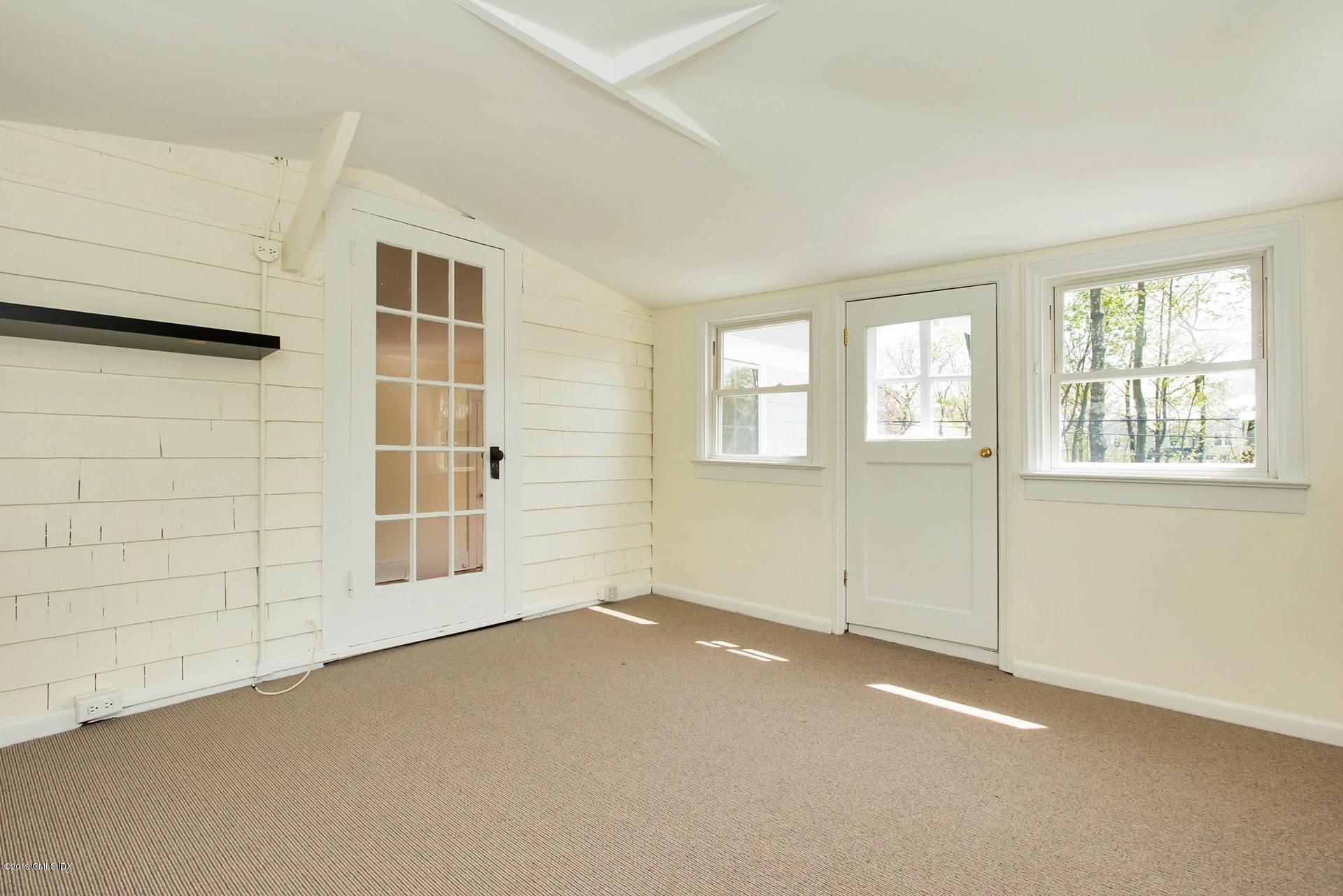 17 Ballwood Road Old Greenwich, CT 06870 - Photo 17 of 36 an empty room with windows