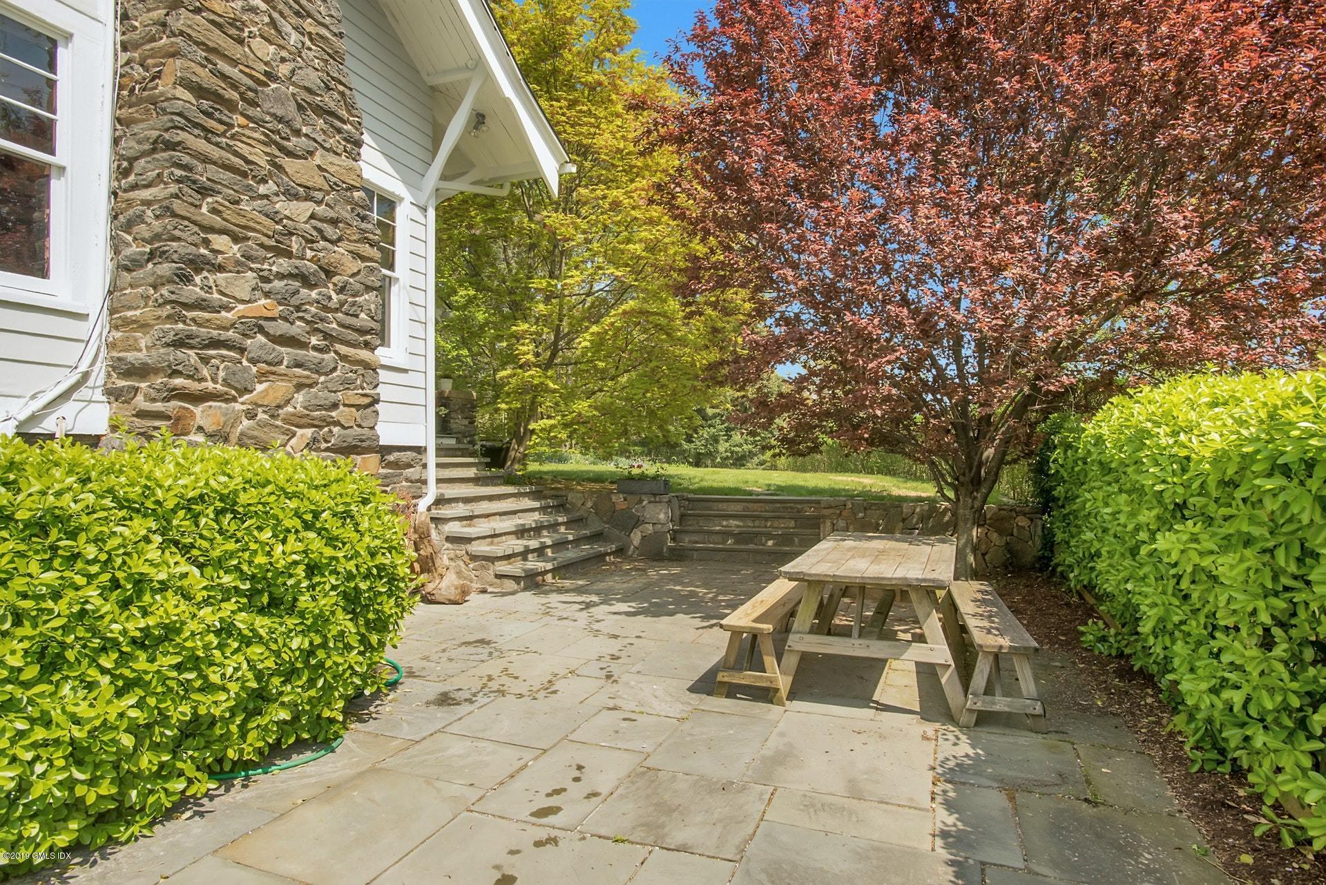 17 Ballwood Road Old Greenwich, CT 06870 - Photo 29 of 36 a view of a lake with a patio
