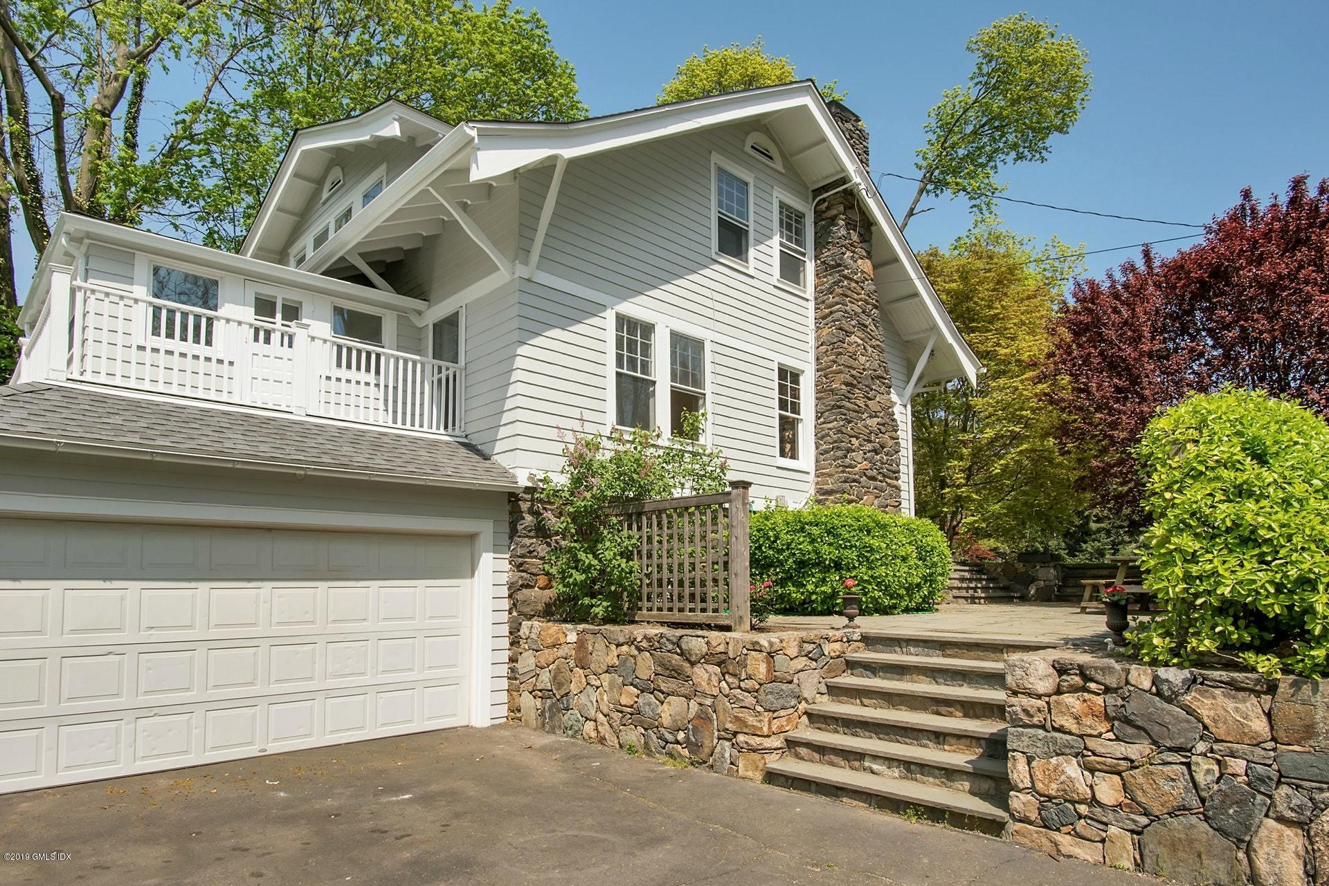 17 Ballwood Road Old Greenwich, CT 06870 - Photo 32 of 36 a view of a house with a garage