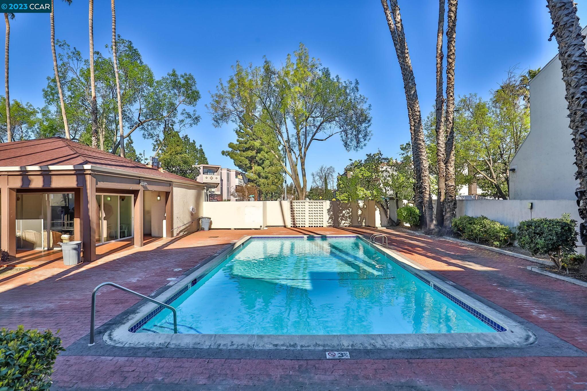 2500 Laguna Circle, Unit C Concord, CA 94520 - Photo 12 of 13 a view of a backyard with swimming pool
