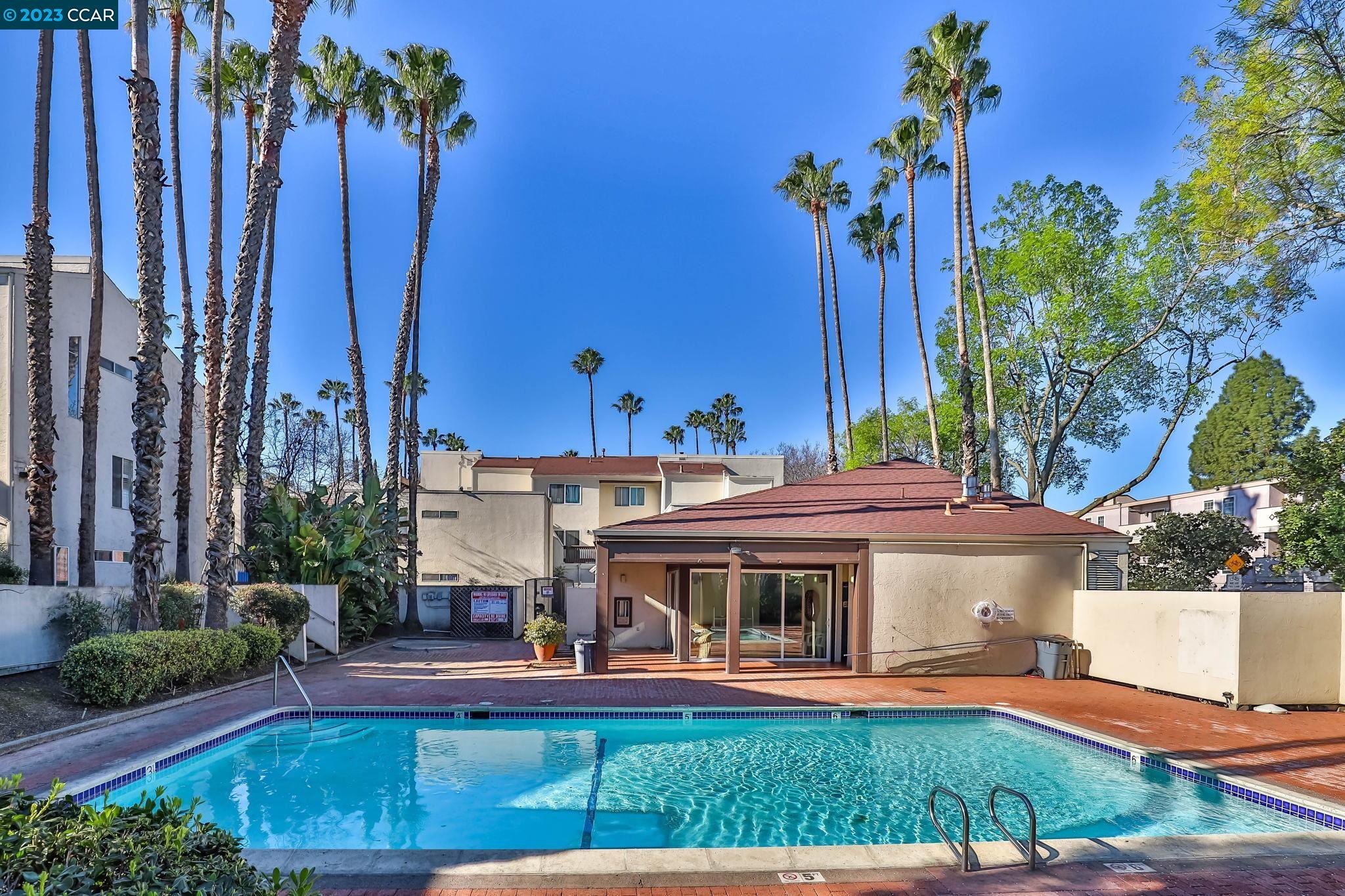 2500 Laguna Circle, Unit C Concord, CA 94520 - Photo 13 of 13 a view of a house with swimming pool and sitting area