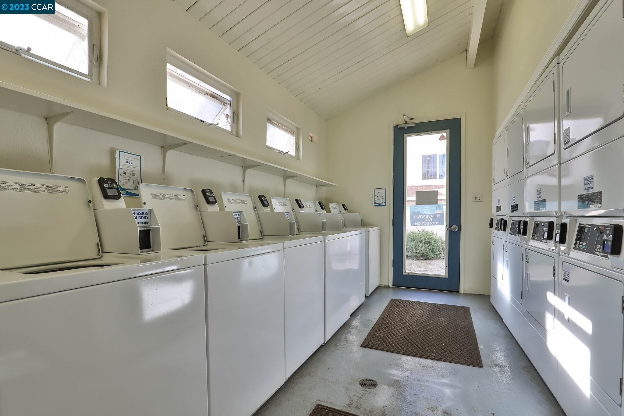 2500 Laguna Circle, Unit C Concord, CA 94520 - Photo 9 of 13 a view of a hallway with windows
