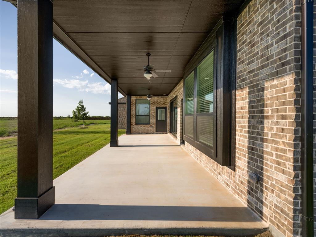 2108 Charters Circle Nevada, TX 75173 - Photo 31 of 37 View of patio / terrace featuring ceiling fan