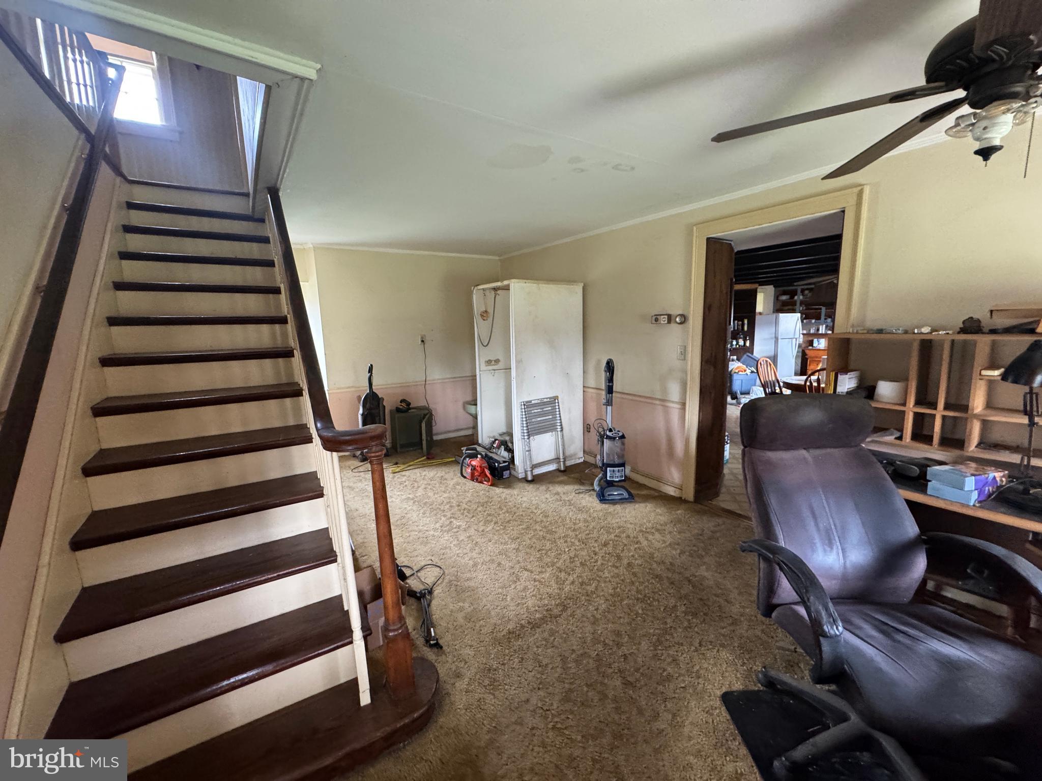 1-19032 Spring Run Rd Spring Run Spring Run, PA 17262 - Photo 66 of 79 a view of a livingroom with furniture and staircase
