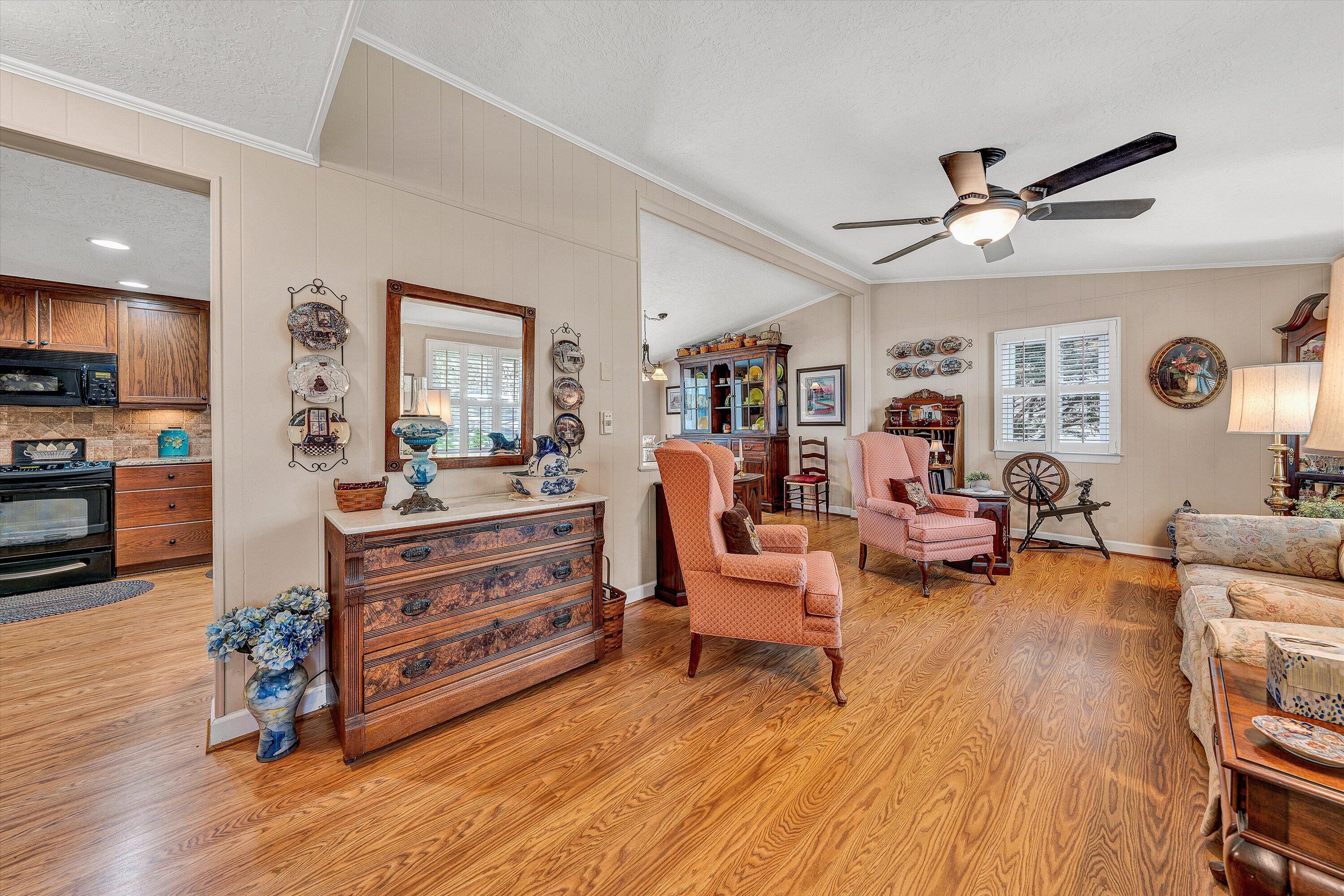 151 Twin Oaks Road Wirtz, VA 24184 - Photo 12 of 41 a living room with furniture and a flat screen tv