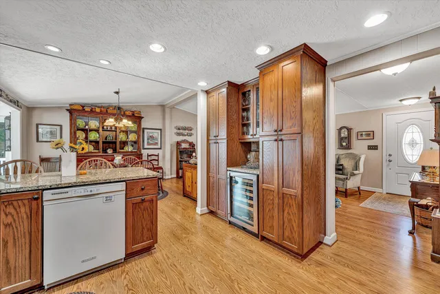 a bedroom with a large bed and a tv