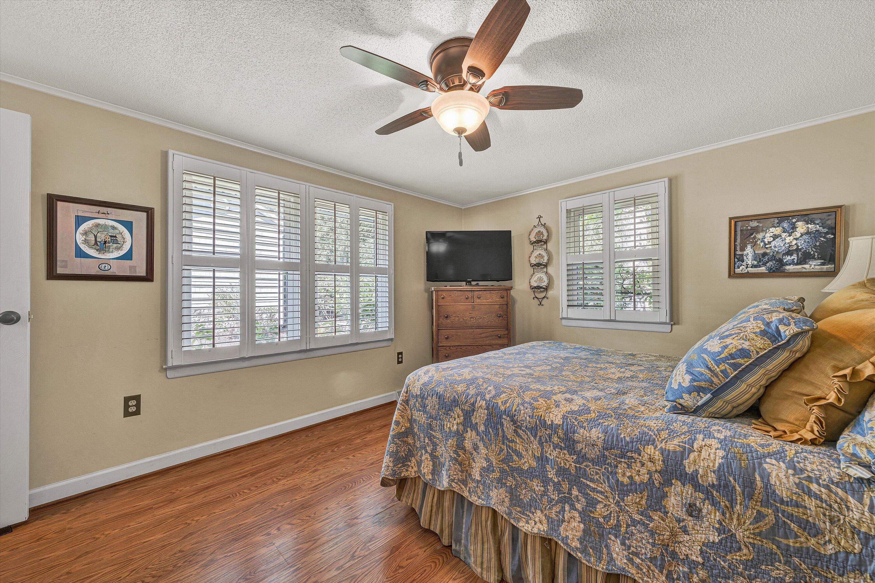 151 Twin Oaks Road Wirtz, VA 24184 - Photo 23 of 41 a bedroom with a large bed and a tv